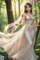 A woman in a wedding dress standing in the woods.